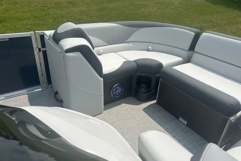 Slide: The Image of 2025 Tahoe 2185 boat interior with plush seating and modern design. - 13