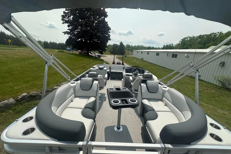 Slide: The Image of 2025 Tahoe 2185 pontoon boat with luxurious seating and modern design. - 16
