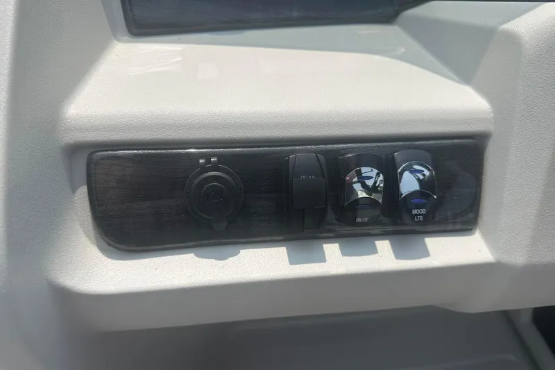 Slide: The Image of Control panel of 2025 Tahoe 2185 with switches for bilge and mood lights. - 24