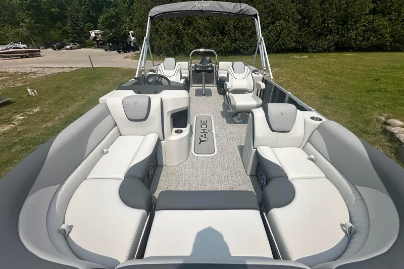 Slide: The Image of 2025 Tahoe 2185 boat interior with plush seating and modern design. - 9