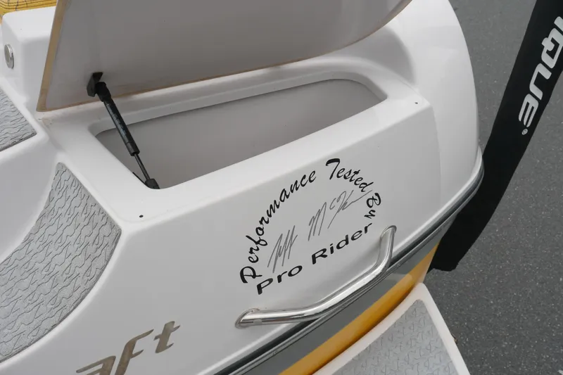 Slide: The Image of 2007 Correct Craft 236 Team Edition boat with "Performance Tested by Pro Rider" signature. - 27