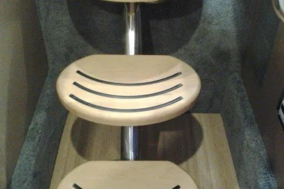 Slide: The Image of 2016 Formula 330 Crossover Bowrider boat stern with dual propellers on a sunny day. - 17