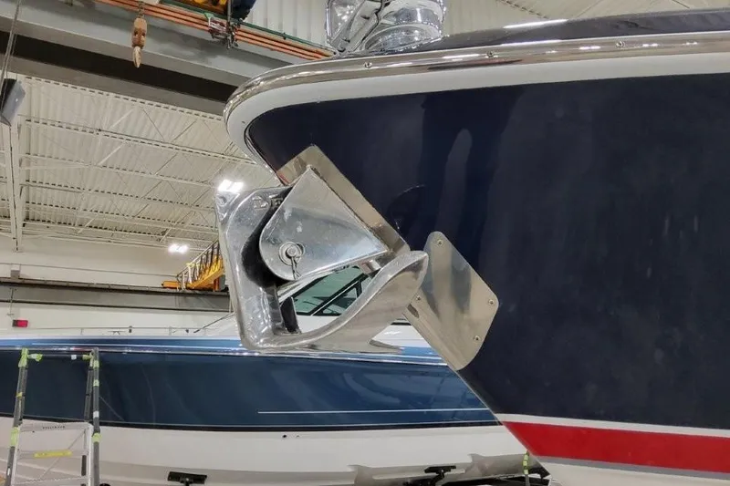 Slide: The Image of 2016 Formula 330 Crossover Bowrider interior with white seating and cup holders. - 32