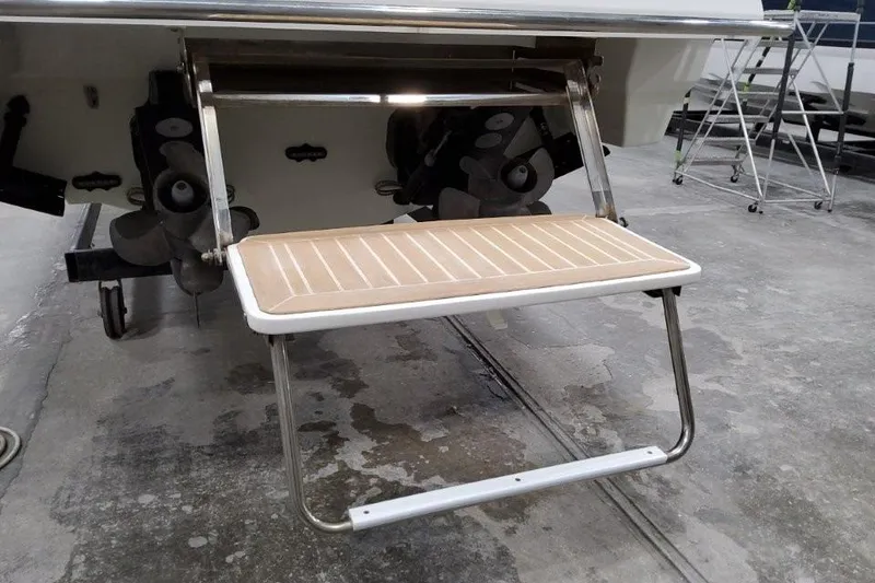 Slide: The Image of 2016 Formula 330 Crossover Bowrider interior with white cushioned seating and modern design. - 34