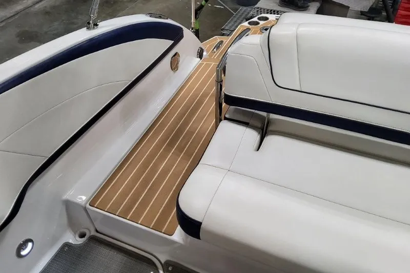 Slide: The Image of 2016 Formula 330 Crossover Bowrider kitchenette with sink and mini fridge. - 44