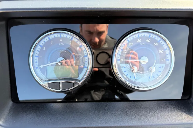 Slide: The Image of Dashboard of 2025 Tahoe 2385 with RPM and MPH gauges. - 18