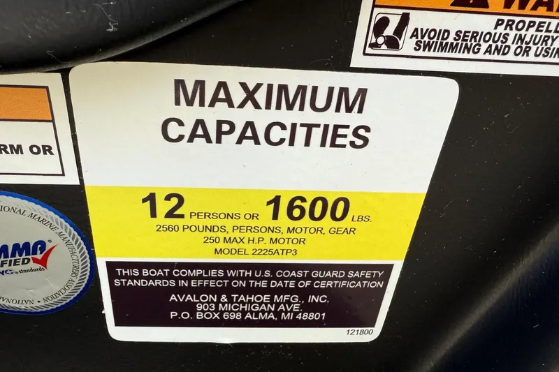 Slide: The Image of Maximum capacity label for Tahoe 2385, 2025 model: 12 persons or 1600 lbs. - 22