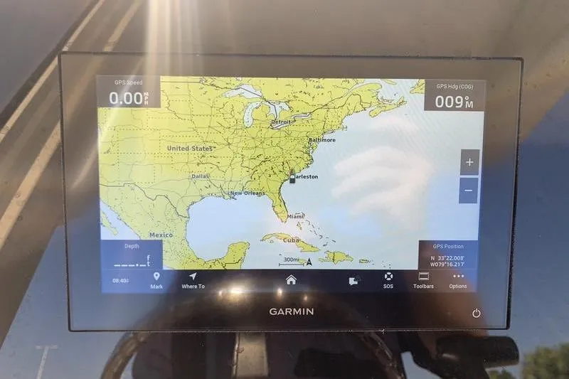 Slide: The Image of Garmin GPS display on 2026 Scout 215 XSF boat, showing U.S. East Coast map. - 21