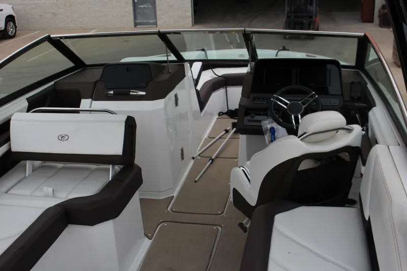 Slide: The Image of Interior of 2021 Cobalt R6 Surf boat with modern seating and steering console. - 3