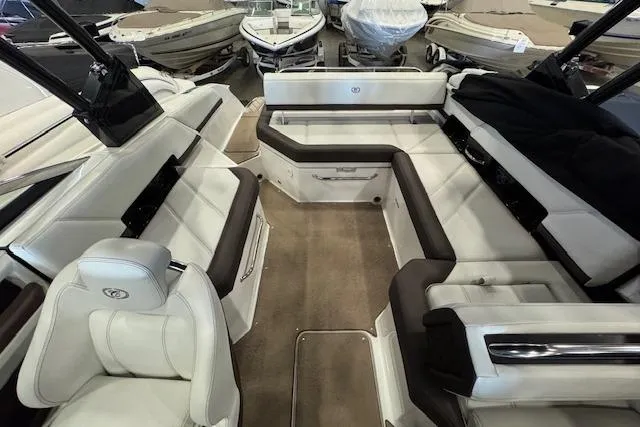 Slide: The Image of 2021 Cobalt R6 Surf boat interior with luxurious seating and modern design. - 4