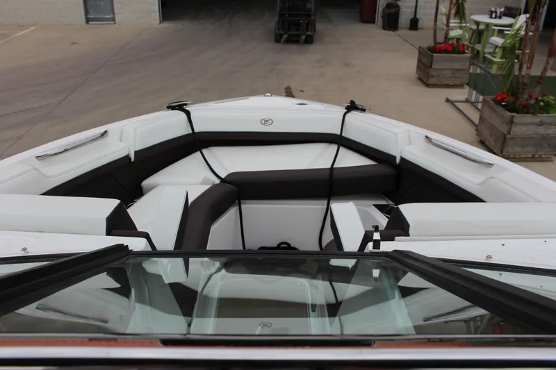 Slide: The Image of 2021 Cobalt R6 Surf boat interior with sleek seating and modern design. - 5