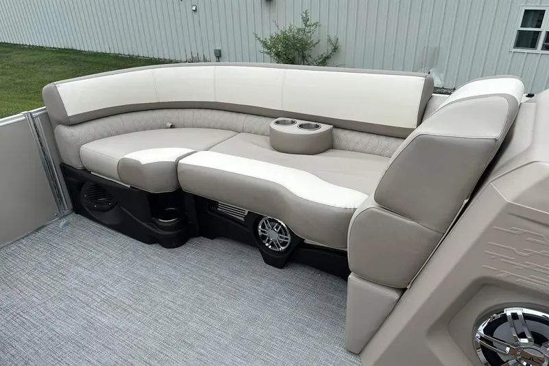 Slide: The Image of Luxurious seating on 2025 Tahoe 2385 boat with cup holders and modern design. - 15