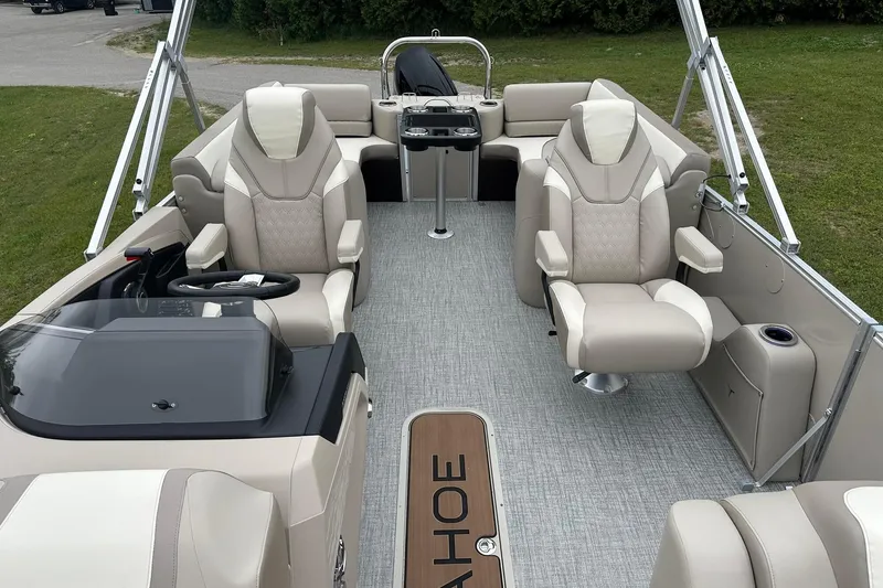 Slide: The Image of 2025 Tahoe 2385 boat interior with luxurious seating and modern design. - 18