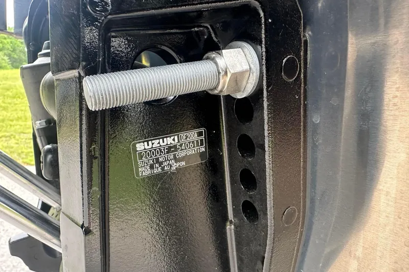 Slide: The Image of Close-up of a Suzuki motor mount on a 2025 Tahoe 2385 boat. - 7