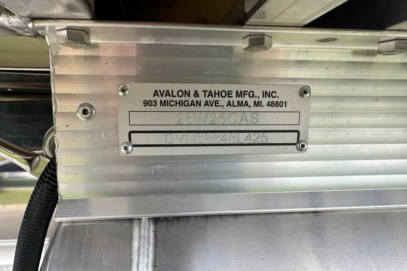Slide: The Image of Metal plate on Tahoe 2385, 2025 model, with manufacturer details and serial number. - 9