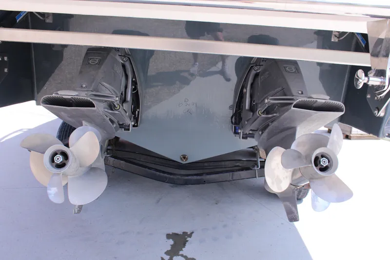 Slide: The Image of 2021 Cobalt R35 Surf boat with dual propellers and outboard motors. - 34