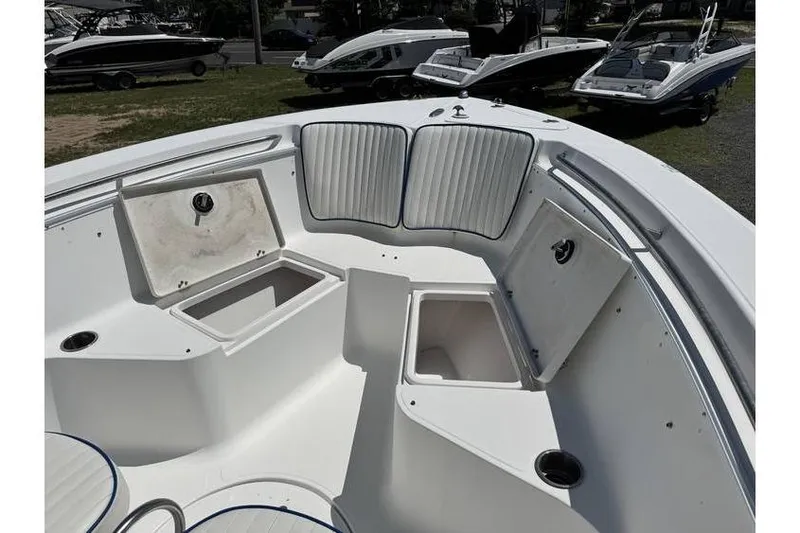 Slide: The Image of 2007 Sea Fox 256 boat interior with open storage compartments and seating. - 8