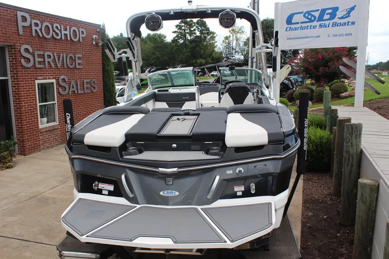 Slide: The Image of 2018 MasterCraft XT22 boat at Charlotte Ski Boats dealership. - 4