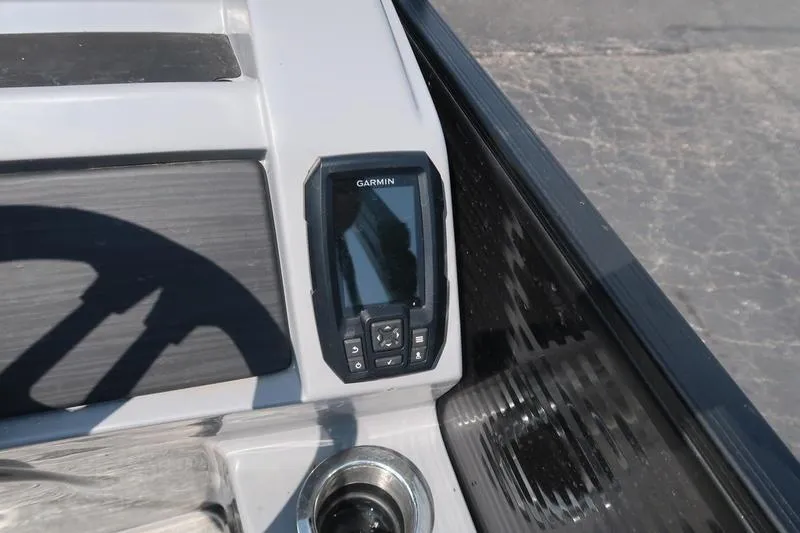 Slide: The Image of Garmin device on 2022 Bennington 23 LSB boat dashboard, featuring sleek design and controls. - 20
