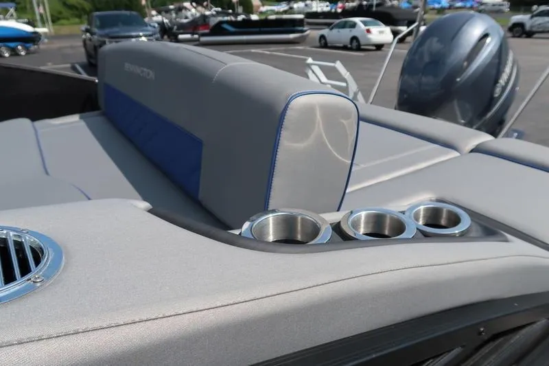 Slide: The Image of 2022 Bennington 23 LSB boat interior with cup holders and seating. - 21