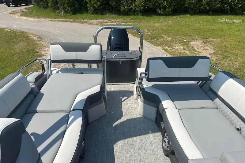 Slide: The Image of 2025 Tahoe 2385 boat interior with luxurious seating and modern design. - 11