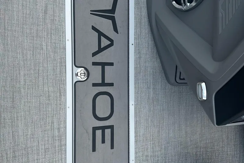 Slide: The Image of 2025 Tahoe 2385 boat deck with logo and sleek design elements. - 29