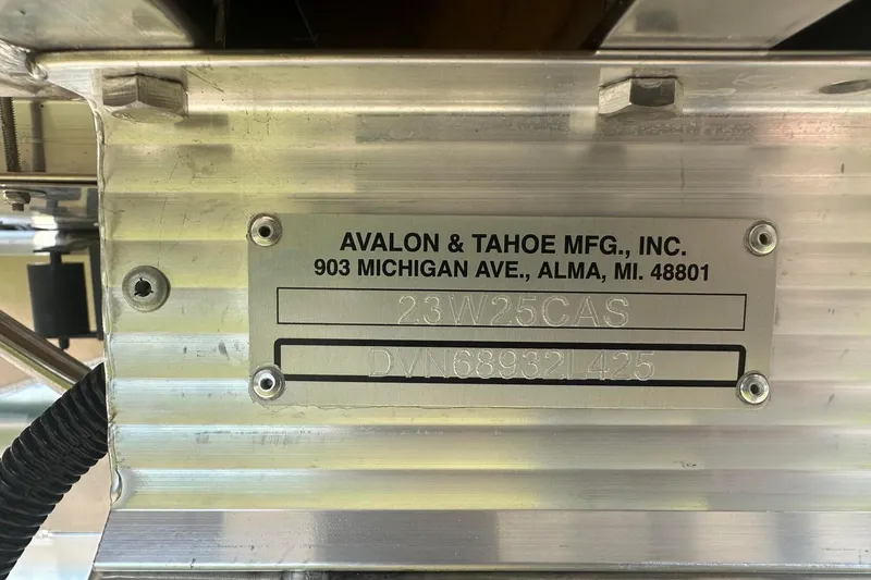 Slide: The Image of Metal identification plate for Avalon & Tahoe MFG, Inc., featuring model and serial numbers. - 31