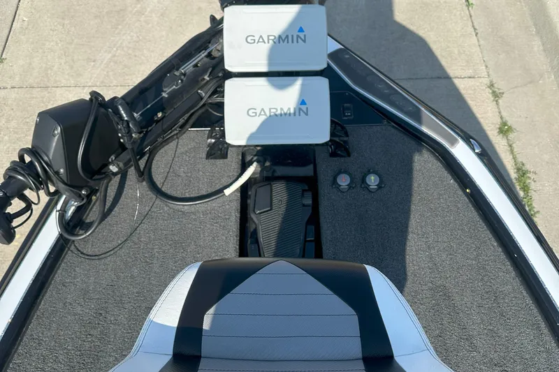 Slide: The Image of 2021 Blazer 650 Pro Tour boat with dual Garmin displays and modern seating. - 13