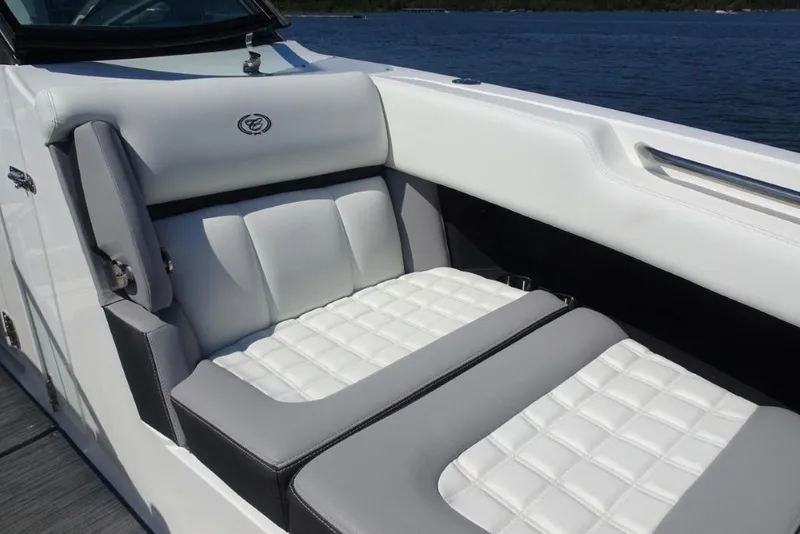 Slide: The Image of Luxurious seating on 2025 Cobalt R30 boat, featuring white and gray upholstery. - 20