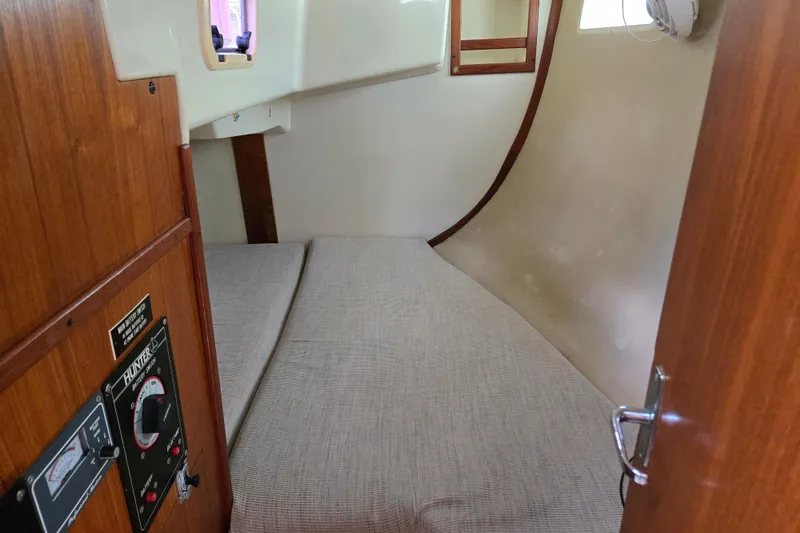 Slide: The Image of Interior cabin of 1992 Hunter 35.5 sailboat with cozy sleeping area. - 19