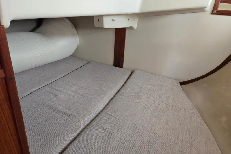 Slide: The Image of Interior cabin of a 1992 Hunter 35.5 sailboat with cushioned sleeping area. - 20