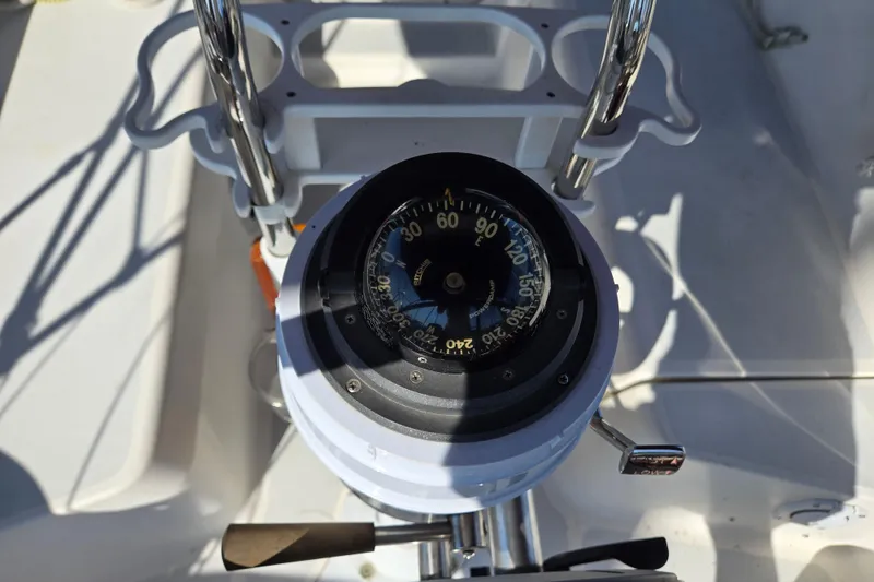Slide: The Image of Compass on a 1992 Hunter 35.5 sailboat, mounted on a white pedestal. - 26