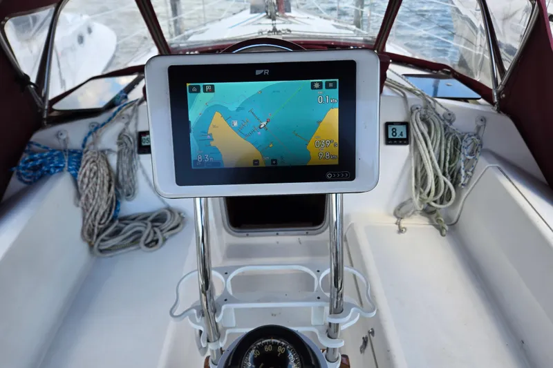 Slide: The Image of Navigation system on 1992 Hunter 35.5 sailboat with ropes and compass visible. - 28