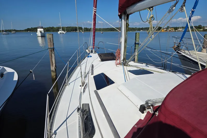 Slide: The Image of Sailboat docked on calm water, 1992 Hunter 35.5 model, sunny day. - 32