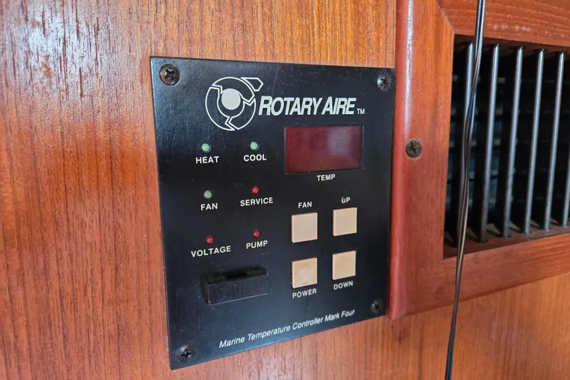 Slide: The Image of Control panel of a 1992 Hunter 35.5 boat with Rotary Aire temperature settings. - 8