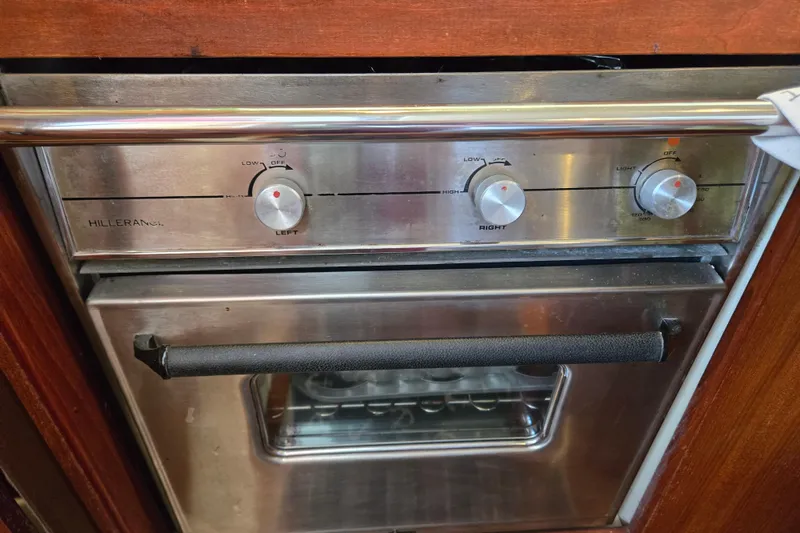 Slide: The Image of Stainless steel oven with control knobs, Hunter 35.5 model, 1992. - 9
