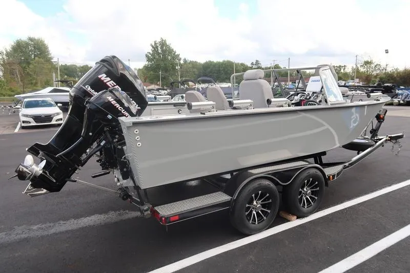 Slide: The Image of 2008 Starcraft STX PRO 2050 boat on trailer with Mercury outboard motor. - 10