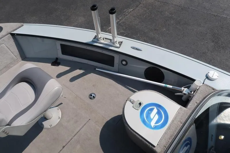 Slide: The Image of 2008 Starcraft STX PRO 2050 boat interior with seating and fishing rod holders. - 15