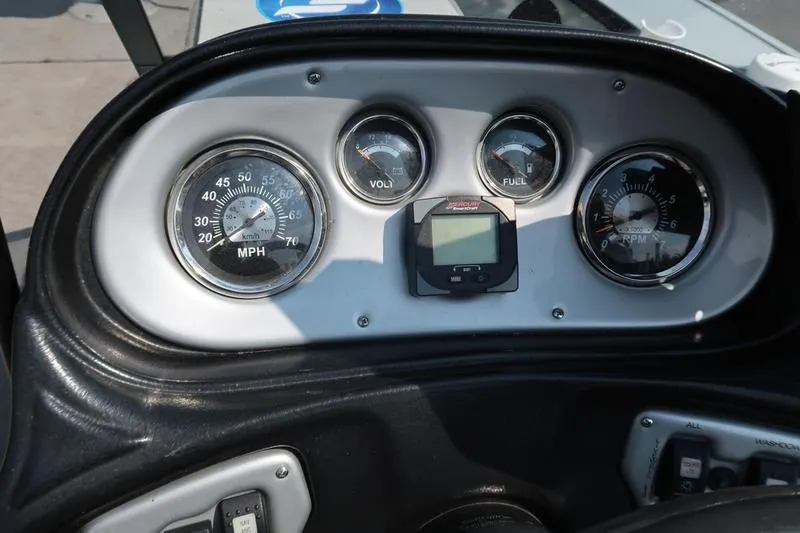 Slide: The Image of Dashboard of 2008 Starcraft STX PRO 2050 boat with speedometer, voltmeter, fuel gauge, and RPM meter. - 19