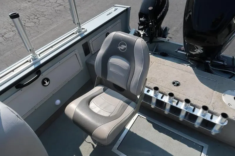 Slide: The Image of 2008 Starcraft STX PRO 2050 boat interior with seat and fishing rod holders. - 24