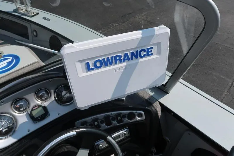 Slide: The Image of 2008 Starcraft STX PRO 2050 boat dashboard with Lowrance fishfinder display. - 25