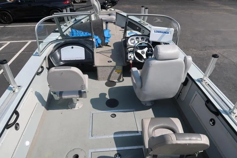 Slide: The Image of 2008 Starcraft STX PRO 2050 boat interior with steering console and seating. - 27
