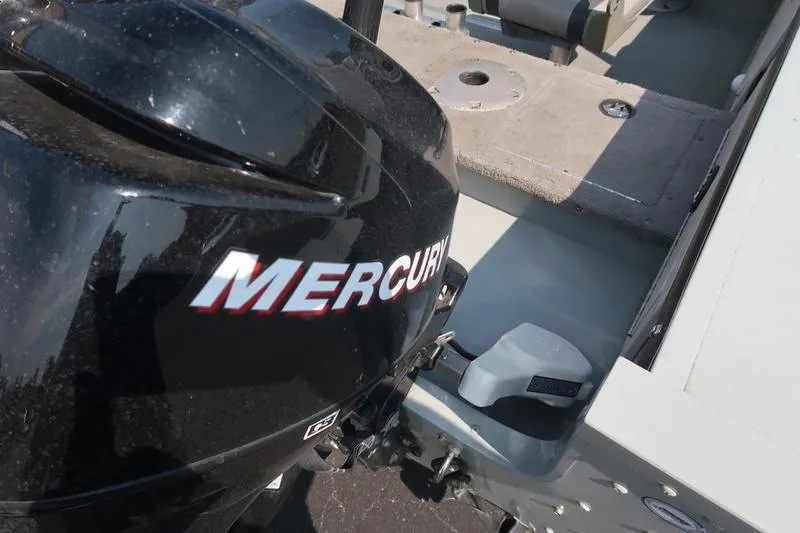 Slide: The Image of 2008 Starcraft STX PRO 2050 boat with Mercury outboard motor, close-up view. - 32
