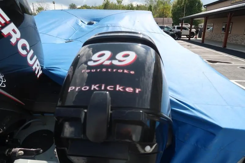 Slide: The Image of 9.9 ProKicker FourStroke outboard motor on covered Starcraft STX PRO 2050 boat, 2008 model. - 35