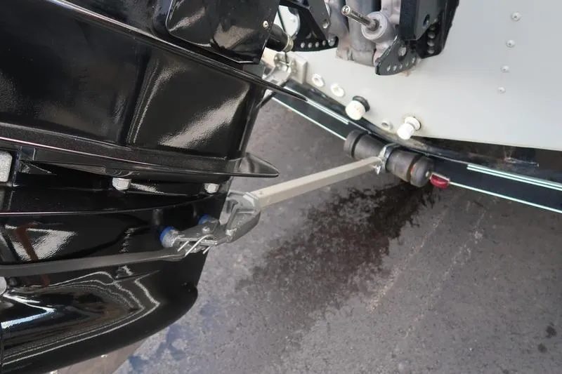 Slide: The Image of Close-up of a 2008 Starcraft STX PRO 2050 boat engine and steering mechanism. - 47