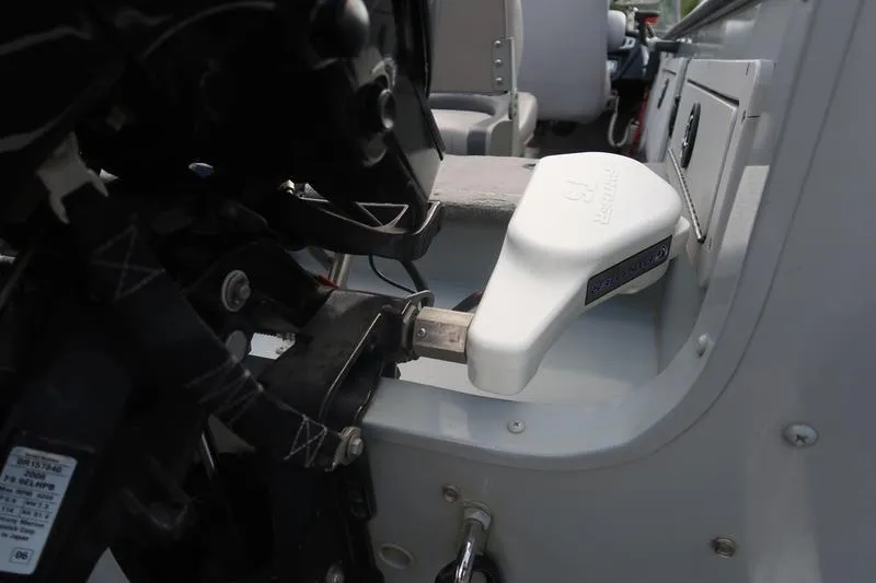 Slide: The Image of 2008 Starcraft STX PRO 2050 boat interior with motor and seating details. - 48