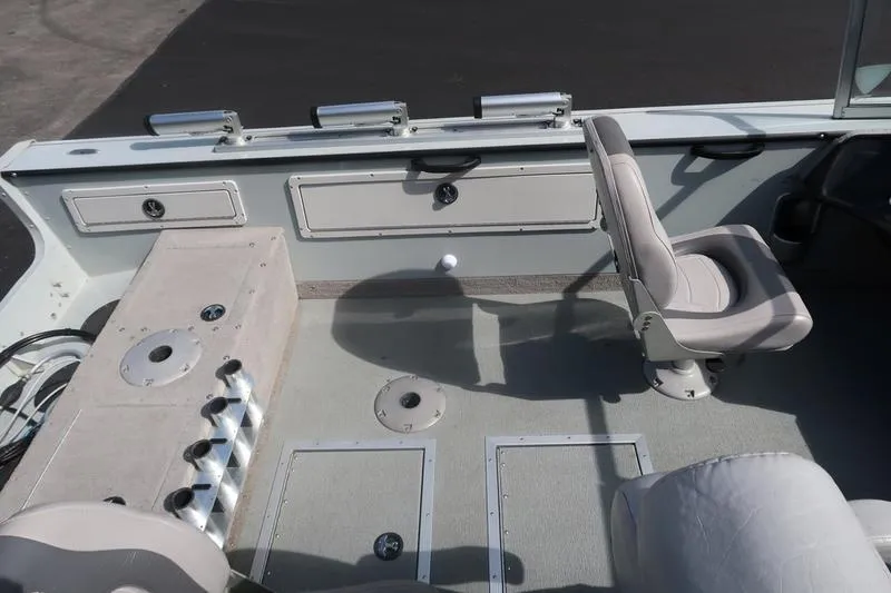 Slide: The Image of 2008 Starcraft STX PRO 2050 boat interior with seating and storage compartments. - 55