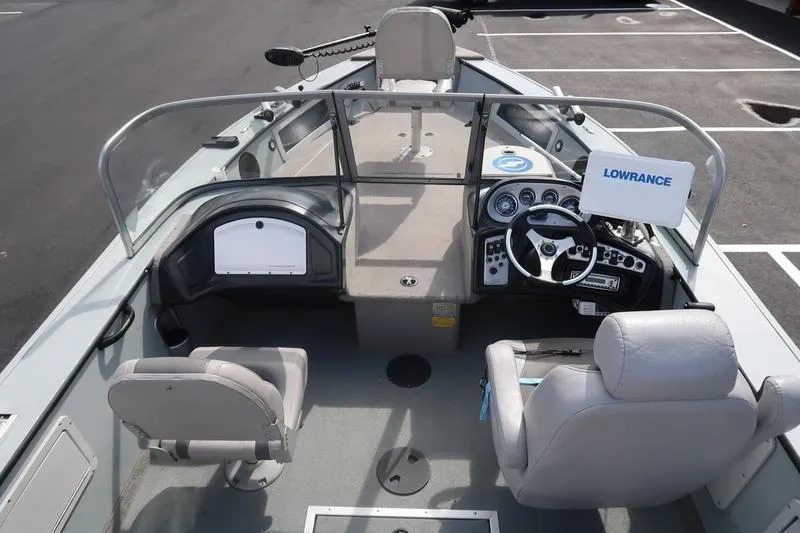 Slide: The Image of 2008 Starcraft STX PRO 2050 boat interior with steering wheel and seating. - 65