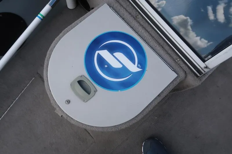 Slide: The Image of 2008 Starcraft STX PRO 2050 boat deck with blue logo and handle. - 69