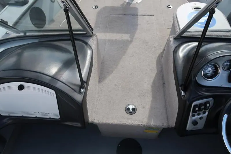 Slide: The Image of 2008 Starcraft STX PRO 2050 boat interior with dashboard and seating area. - 70